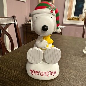 Festive Snoopy Holiday Decor with Striped Hat